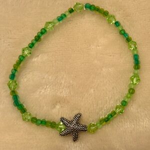 Hand beaded sea glass and starfish bracelet ⭐️💚